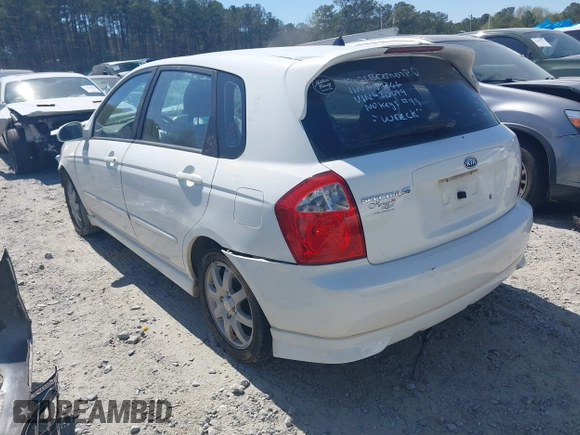 2006 Kia Spectra with VIN KNAFE162765318099, listed as a IAAI auction lot 41890796 with 241,431 mi miles. Bid and sale history available at carsss.com. Image 3.