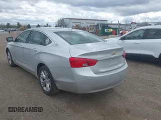 2014 Chevrolet Impala LT with VIN 1G1125S34EU123487, listed as a IAAI auction lot 42088001 with 184,553 mi miles and . Bid and sale history available at DreamBid. Image 3.