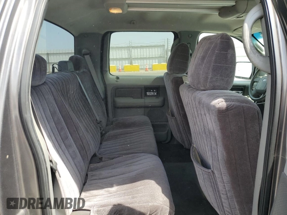 2004 Ford F-150 XLT with VIN 1FTRW12W74KC26169, listed as a Copart auction lot 68393914 with 118,059 mi miles and Salvage Title. Bid and sale history available at DreamBid. Image 10.