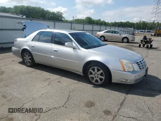 2009 Cadillac DTS 1SA z VIN 1G6KD57Y19U136085, wystawiony jako Copart lot #56983425 z przebiegiem 115 468 mil mil oraz Czysty tytuł • Clean title. Historia ofert i sprzedaży dostępna na DreamBid. Obrazek 4.