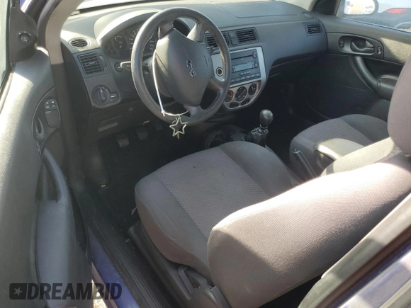 2005 Ford Focus S with VIN 3FAFP31N95R107868, listed as a Copart auction lot 85765944 with 189,739 mi miles and Salvage Title. Bid and sale history available at carsss.com. Image 8.