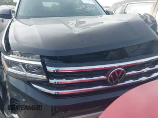 2023 Volkswagen Atlas SE z VIN 1V2JR2CA6PC504408, wystawiony jako IAAI lot #41475520 z przebiegiem 45 932 mil mil oraz . Historia ofert i sprzedaży dostępna na DreamBid. Obrazek 12.