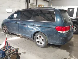 2010 Honda Odyssey Touring with VIN 5FNRL3H98AB095042, listed as a IAAI auction lot 41394894 with 254,525 mi miles. Bid and sale history available at carsss.com. Image 3.