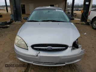 2000 Ford Taurus SE with VIN 1FAFP532XYA141783, listed as a Copart auction lot 43949795 with 203,939 mi miles and Salvage Title. Bid and sale history available at DreamBid. Image 5.
