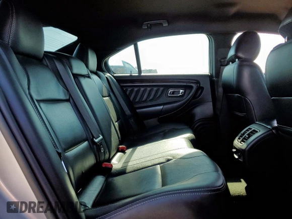 2013 Ford Taurus Limited with VIN 1FAHP2F84DG129904, listed as a Copart auction lot 58218205 with 105,877 mi miles and Salvage title. Bid and sale history available at DreamBid. Image 10.