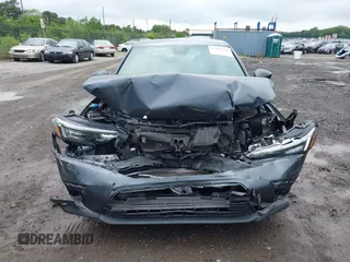 2023 Honda Civic Sport with VIN 2HGFE2F5XPH515699, listed as a IAAI auction lot 42441217 with 44,595 mi miles and . Bid and sale history available at DreamBid. Image 12.
