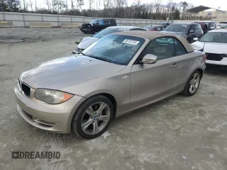 2010 BMW 1 Series 128i with VIN WBAUL7C53AVJ77295, listed as a Copart auction lot 86122734 with 138,270 mi miles and Salvage Title. Bid and sale history available at carsss.com. Image 1.