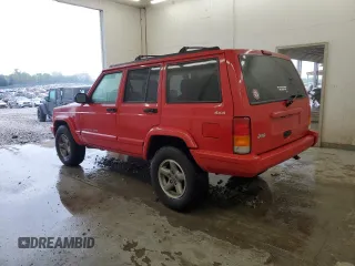 1998 Jeep Cherokee Sport with VIN 1J4FJ68S7WL148034, listed as a Copart auction lot 52436475 with 80,239 mi miles and Salvage Title. Bid and sale history available at carsss.com. Image 2.
