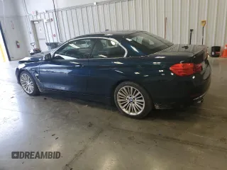 2014 BMW 4 Series 428i with VIN WBA3V7C56EP770827, listed as a Copart auction lot 64235014 with 110,250 mi miles and Salvage Title. Bid and sale history available at DreamBid. Image 2.