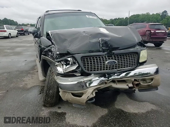 2002 Ford Expedition Eddie Bauer with VIN 1FMPU18LX2LA39571, listed as a Copart auction lot 58774915 with 388,886 mi miles and Salvage title. Bid and sale history available at DreamBid. Image 14.