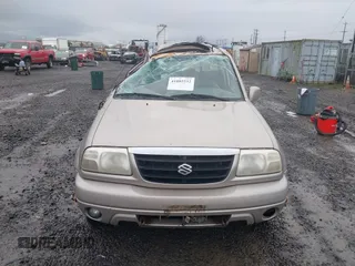 2001 Suzuki XL7 Standard z VIN JS3TX92VX14114699, wystawiony jako IAAI lot #41085552 z przebiegiem 195 316 mil mil oraz . Historia ofert i sprzedaży dostępna na DreamBid. Obrazek 13.