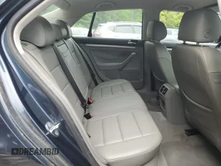 2005 Volkswagen Jetta 2.5L with VIN 3VWRG71K45M628981, listed as a Copart auction lot 58531595 with 128,217 mi miles and Salvage title. Bid and sale history available at DreamBid. Image 10.