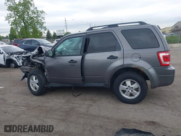 2012 Ford Escape XLT with VIN 1FMCU0D70CKB57640, listed as a IAAI auction lot 42364980 with 122,652 mi miles and . Bid and sale history available at DreamBid. Image 14.
