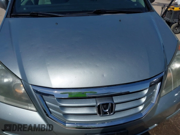 2010 Honda Odyssey EX with VIN 5FNRL3H44AB059711, listed as a IAAI auction lot 42057760 with 225,486 mi miles and . Bid and sale history available at DreamBid. Image 6.