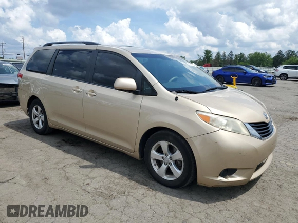 2014 Toyota Sienna LE AAS with VIN 5TDKK3DC4ES412399, listed as a Copart auction lot 65276625 with 264,283 mi miles and Clean title. Bid and sale history available at DreamBid. Image 4.