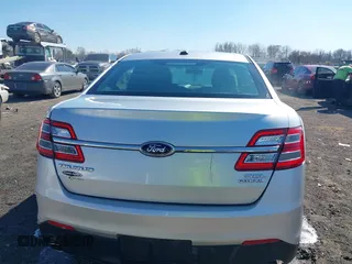 2013 Ford Taurus SEL with VIN 1FAHP2E8XDG164903, listed as a IAAI auction lot 41580690 with 163,128 mi miles and . Bid and sale history available at carsss.com. Image 16.