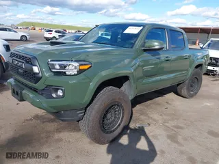 2021 Toyota Tacoma 4WD SR with VIN 3TMCZ5AN4MM401998, listed as a IAAI auction lot 41712813 with 91,371 mi miles. Bid and sale history available at carsss.com. Image 18.