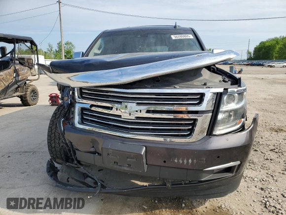 2015 Chevrolet Tahoe LTZ z VIN 1GNSKCKC4FR626030, wystawiony jako Copart lot #56280805 z przebiegiem Nie podano mil oraz Szkoda całkowita • Salvage title. Historia ofert i sprzedaży dostępna na DreamBid. Obrazek 5.