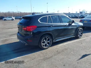2018 BMW X1 xDrive28i with VIN WBXHT3C36J5F91110, listed as a IAAI auction lot 41757293 with 80,327 mi miles. Bid and sale history available at carsss.com. Image 4.