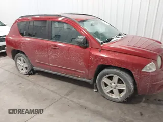 2010 Jeep Compass Sport with VIN 1J4NF4FB2AD506051, listed as a IAAI auction lot 41552084 with 218,785 mi miles. Bid and sale history available at carsss.com. Image 1.