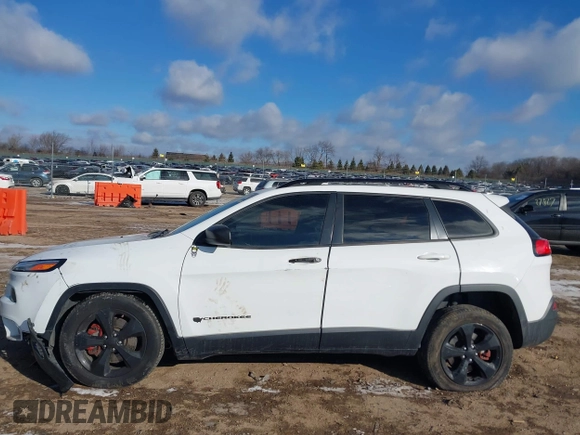 2015 Jeep Cherokee North with VIN 1C4PJMCS7FW792850, listed as a IAAI auction lot 41323432 with 102,642 mi miles. Bid and sale history available at carsss.com. Image 14.