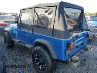 1992 Jeep Wrangler z VIN 2J4FY19P6NJ559597, wystawiony jako Copart lot #74990384 z przebiegiem 150 298 mil mil oraz Szkoda całkowita • Salvage title. Historia ofert i sprzedaży dostępna na DreamBid. Obrazek 2.