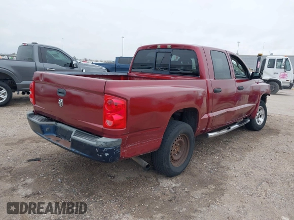 2006 Dodge Dakota SLT with VIN 1D7HE48KX6S598831, listed as a IAAI auction lot 41292884 with 173,181 mi miles and . Bid and sale history available at carsss.com. Image 4.