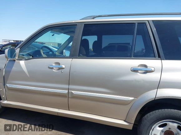 2003 Suzuki XL7 Touring with VIN JS3TX92V534103046, listed as a IAAI auction lot 41978971 with 185,038 mi miles and . Bid and sale history available at DreamBid. Image 14.