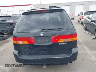 2004 Honda Odyssey EX-L with VIN 5FNRL18914B037976, listed as a IAAI auction lot 41893438 with Not Provided miles and . Bid and sale history available at DreamBid. Image 16.