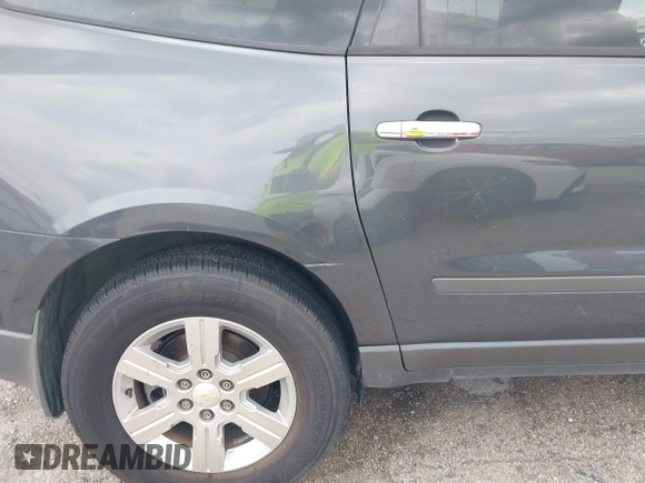 2012 Chevrolet Traverse LS with VIN 1GNKREED5CJ375122, listed as a IAAI auction lot 41993388 with 216,062 mi miles and . Bid and sale history available at DreamBid. Image 13.