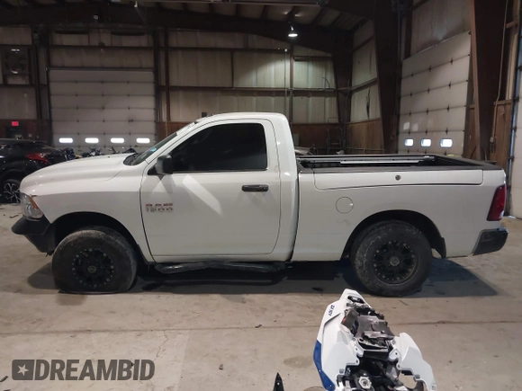 2014 Ram 1500 Express with VIN 3C6JR6AG7EG310097, listed as a IAAI auction lot 41409343 with 134,140 mi miles and . Bid and sale history available at DreamBid. Image 14.
