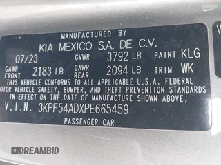 2023 Kia Forte GT-Line z VIN 3KPF54ADXPE665459, wystawiony jako IAAI lot #42102849 z przebiegiem 31 554 mil mil oraz . Historia ofert i sprzedaży dostępna na DreamBid. Obrazek 9.