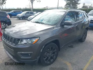 2021 Jeep Compass 80th Anniversary with VIN 3C4NJCEB7MT596909, listed as a IAAI auction lot 41376547 with 54,058 mi miles and . Bid and sale history available at DreamBid. Image 2.