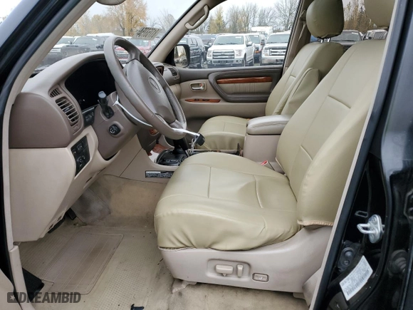 1999 Lexus LX 470 Luxury SUV with VIN JT6HT00W2X0032027, listed as a Copart auction lot 81753754 with NaN miles and Salvage Title. Bid and sale history available at carsss.com. Image 7.