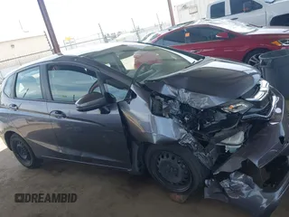 2020 Honda Fit LX z VIN 3HGGK5H42LM728368, wystawiony jako IAAI lot #42271576 z przebiegiem 266 363 mil mil oraz . Historia ofert i sprzedaży dostępna na DreamBid. Obrazek 13.