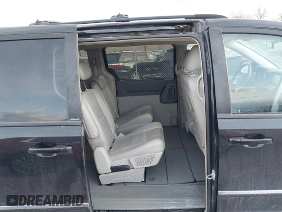 2008 Dodge Grand Caravan SXT with VIN 2D8HN54P48R827298, listed as a IAAI auction lot 41972302 with 199,903 mi miles and . Bid and sale history available at DreamBid. Image 8.