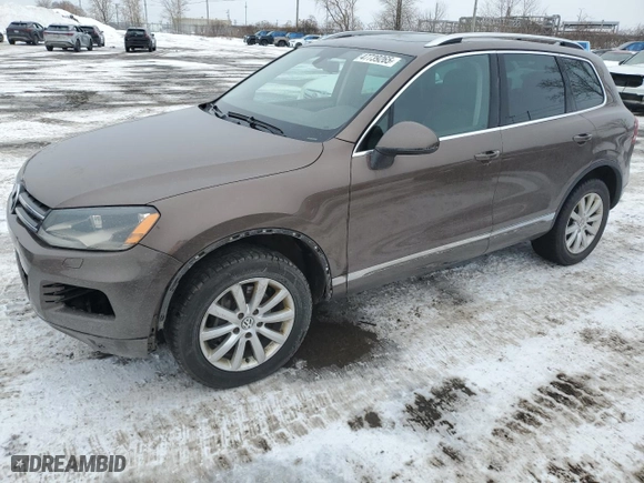 2012 Volkswagen Touareg Sport with VIN WVGEF9BP8CD006057, listed as a Copart auction lot 47739265 with 213,580 mi miles and Salvage Title. Bid and sale history available at carsss.com. Image 1.