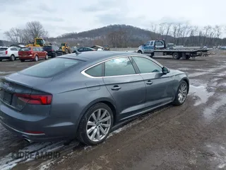 2018 Audi A5 Sportback Premium Plus z VIN WAUBNCF52JA124956, wystawiony jako IAAI lot #41606230 z przebiegiem 100 067 mil mil oraz . Historia ofert i sprzedaży dostępna na DreamBid. Obrazek 4.