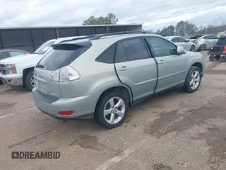 2007 Lexus RX 350 with VIN 2T2GK31U07C014696, listed as a IAAI auction lot 41669351 with 133,047 mi miles. Bid and sale history available at carsss.com. Image 4.