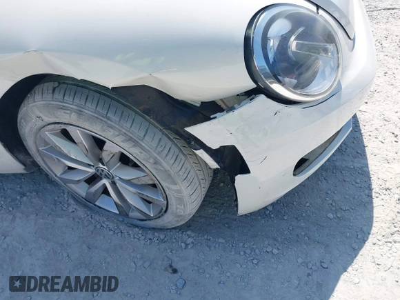 2013 Volkswagen Beetle 2.5L with VIN 3VW5P7AT3DM811617, listed as a IAAI auction lot 42055769 with 93,810 mi miles and . Bid and sale history available at DreamBid. Image 6.