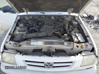 2002 Mazda B-Series 2WD Truck DS with VIN 4F4YR46E52TM16539, listed as a Copart auction lot 82949474 with 201,917 mi miles and Salvage Title. Bid and sale history available at carsss.com. Image 12.