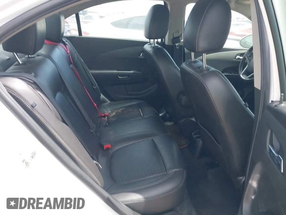 2014 Chevrolet Sonic LTZ with VIN 1G1JE5SB4E4227749, listed as a IAAI auction lot 38965556 with 69,550 mi miles. Bid and sale history available at carsss.com. Image 8.