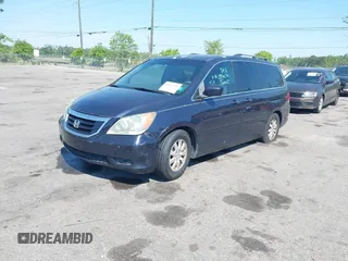 2008 Honda Odyssey EX-L with VIN 5FNRL38778B094070, listed as a IAAI auction lot 41842536 with 211,390 mi miles. Bid and sale history available at carsss.com. Image 2.
