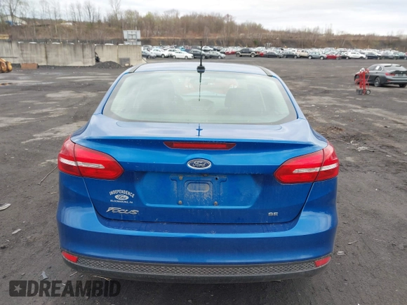 2018 Ford Focus SE z VIN 1FADP3F23JL200674, wystawiony jako IAAI lot #42009238 z przebiegiem 78 007 mil mil oraz . Historia ofert i sprzedaży dostępna na DreamBid. Obrazek 16.
