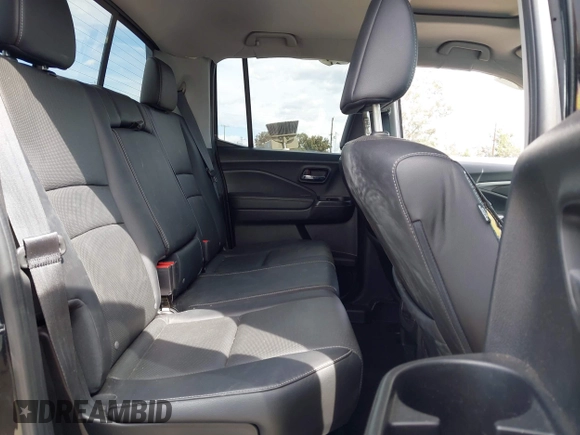 2020 Honda Ridgeline RTL with VIN 5FPYK3F53LB030107, listed as a IAAI auction lot 41933517 with 93,373 mi miles and . Bid and sale history available at DreamBid. Image 8.