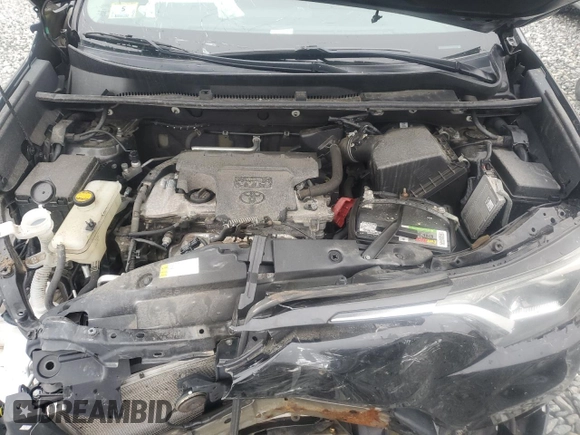 2017 Toyota RAV4 LE z VIN 2T3BFREV4HW663532, wystawiony jako Copart lot #57798035 z przebiegiem 100 922 mil mil oraz Szkoda całkowita • Salvage title. Historia ofert i sprzedaży dostępna na DreamBid. Obrazek 12.