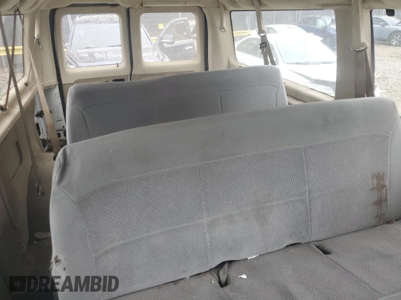 2006 Ford Econoline Passenger XL with VIN 1FBNE31L36HA02924, listed as a Copart auction lot 79903244 with 217,831 mi miles and Salvage title. Bid and sale history available at DreamBid. Image 11.
