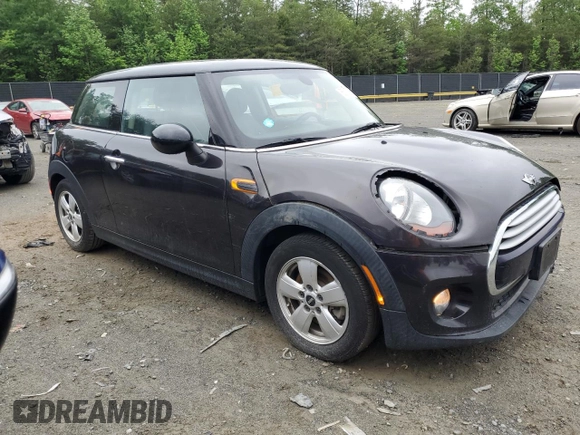 2014 MINI Hardtop with VIN WMWXM5C57ET932920, listed as a Copart auction lot 55810575 with 73,151 mi miles and Salvage title. Bid and sale history available at DreamBid. Image 4.