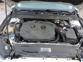 2016 Ford Fusion Titanium with VIN 3FA6P0K96GR158621, listed as a IAAI auction lot 41678349 with 182,162 mi miles. Bid and sale history available at carsss.com. Image 10.