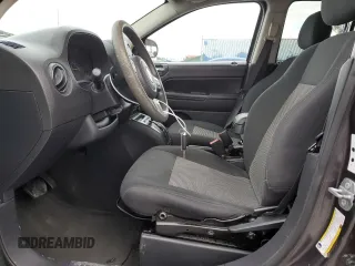 2015 Jeep Compass Sport with VIN 1C4NJCBB2FD171451, listed as a Copart auction lot 89289005 with 126,520 mi miles and Salvage Title. Bid and sale history available at carsss.com. Image 7.